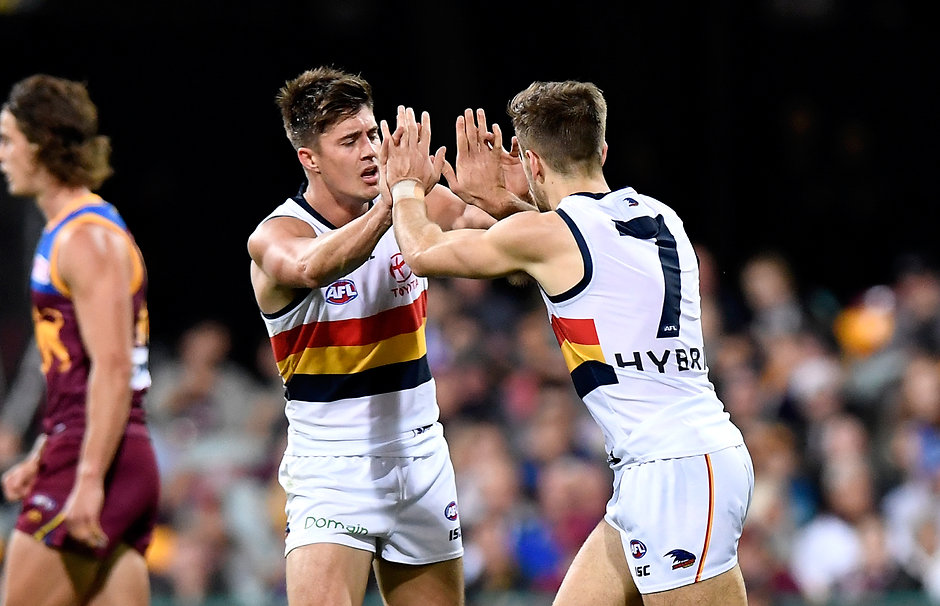AFL 2018 Round 18 - Brisbane v Adelaide BRISBANE, AUSTRALIA - JULY 21: Jordan Gallucci of the Crows celebrates kicking a goal during the round 18 AFL match between the Brisbane Lions and the Adelaide Crows at The Gabba on July 21, 2018 in Brisbane, Australia. (Photo by Bradley Kanaris/Getty Images/AFL Media)